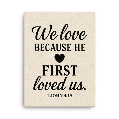 1 John 419 We love because he first loved us canvas print on a plain backdrop in size 18