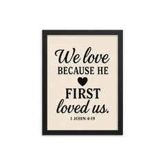 1 John 419 We love because he first loved us framed print on a plain backdrop in size 12"x16".