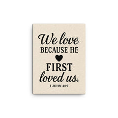 1 John 419 We love because he first loved us canvas print on a plain backdrop in size 12"x16".