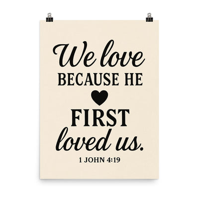 1 John 419 We love because he first loved us poster on a plain backdrop in size 8