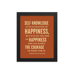 “Self knowledge is no guarantee of happiness but it is on the side of happiness and can supply the courage to fight for it ” Simone de Beauvoir framed print on a plain backdrop in size 8"x10".