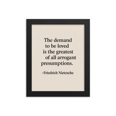 “The demand to be loved is the greatest of all arrogant presumptions ” Friedrich Nietzsche framed print on a plain backdrop in size 8"x10".