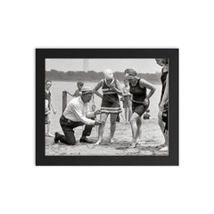A beach police officer measures the length of a bathing suit to ensure it complies with modesty laws, Washington, DC 1922 framed print on a plain backdrop in size 8"x10".