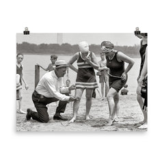 A beach police officer measures the length of a bathing suit to ensure it complies with modesty laws, Washington, DC 1922 poster on a plain backdrop in size 8"x10".