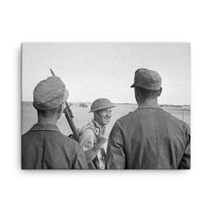 A British Soldier Giving a V-for-Victory Sign to German Prisoners at El Alamein, 26 October 1942 canvas print on a plain backdrop in size 18"x24".