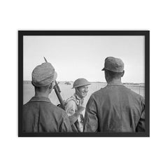 A British Soldier Giving a V-for-Victory Sign to German Prisoners at El Alamein, 26 October 1942 framed print on a plain backdrop in size 16"x20".