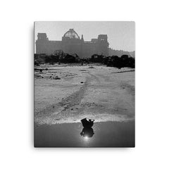 A Broken German Stahlhelm in a Puddle with Reichstag Ruins, Berlin canvas print on a plain backdrop in size 16"x20".
