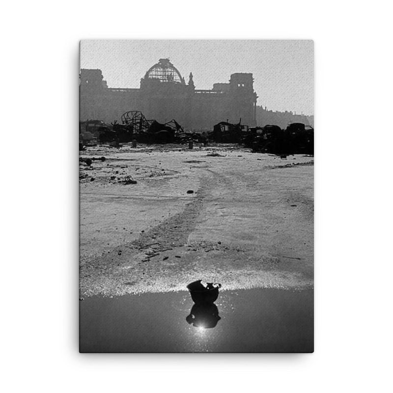 A Broken German Stahlhelm in a Puddle with Reichstag Ruins, Berlin canvas print on a plain backdrop in size 18