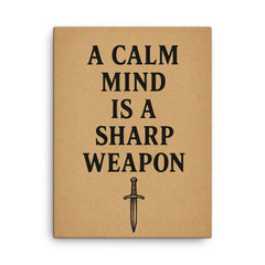 A calm mind is a sharp weapon canvas print on a plain backdrop in size 18"x24".