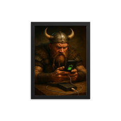 A fierce Viking warrior anxiously watching his smartphone charge on a power bank framed print on a plain backdrop in size 12"x16".