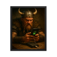 A fierce Viking warrior anxiously watching his smartphone charge on a power bank framed print on a plain backdrop in size 16"x20".