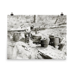 A man operating a moonshine still in a remote location - Texas, 1923 poster on a plain backdrop in size 8"x10".