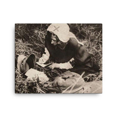 A Red Cross Nurse Writing Down the Last Words of a Mortally Wounded Soldier, 1917 canvas print on a plain backdrop in size 16"x20".