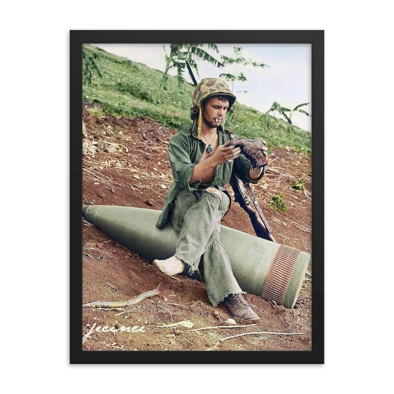 A US Marine Clearing His Boot on a 16” Naval Artillery Shell, Saipan, June 1944 framed print on a plain backdrop in size 18