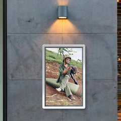 A US Marine Clearing His Boot on a 16” Naval Artillery Shell, Saipan, June 1944 poster 2