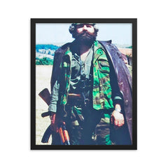 Adem Jashari framed print on a plain backdrop in size 16"x20".