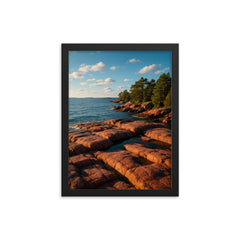 Aland Red Granite Shores Finland framed print on a plain backdrop in size 12"x16".
