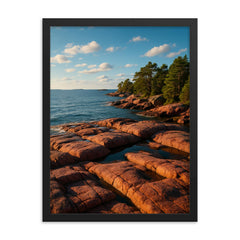 Aland Red Granite Shores Finland framed print on a plain backdrop in size 18"x24".