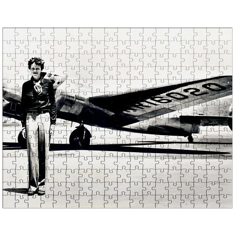 Amelia Earhart standing in front of the Lockheed Electra jigsaw puzzle