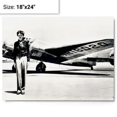 Amelia Earhart standing in front of the Lockheed Electra metal print on a plain backdrop in size 18"x24".
