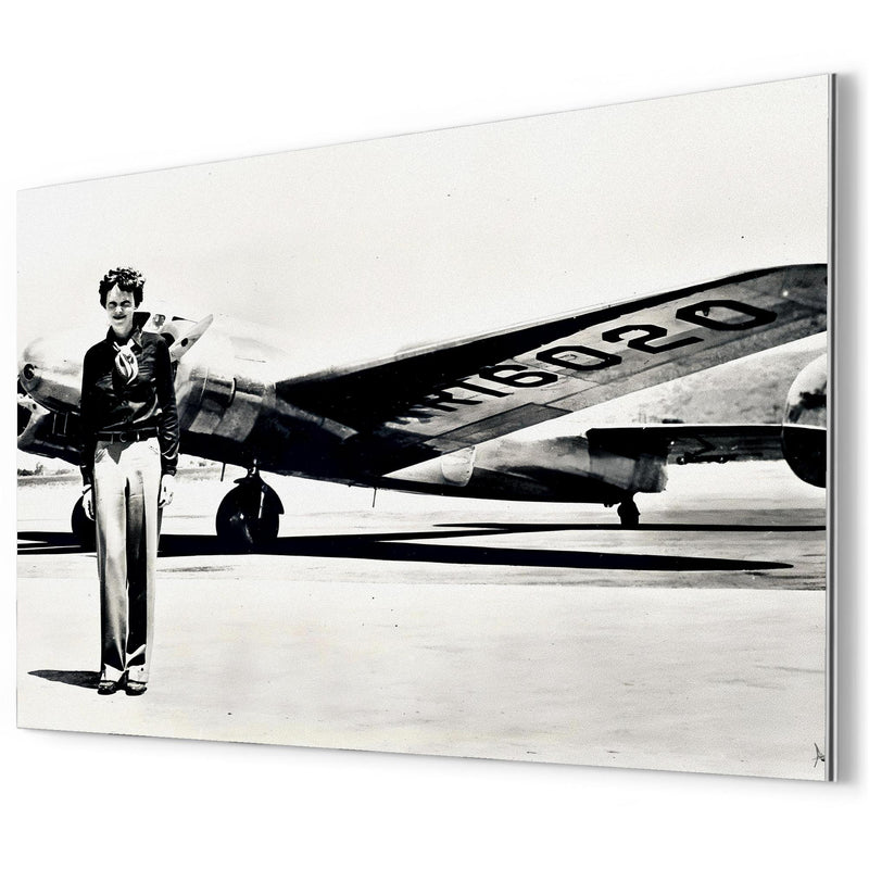 Amelia Earhart standing in front of the Lockheed Electra metal print mockup