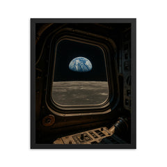Apollo 8 Earthrise through command module window framed print on a plain backdrop in size 16"x20".