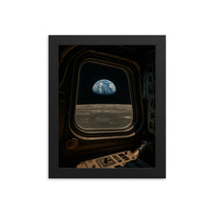 Apollo 8 Earthrise through command module window framed print on a plain backdrop in size 8"x10".