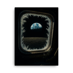 Apollo 8 Earthrise through frost rimmed command window canvas print on a plain backdrop in size 18"x24".