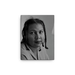 Bell Hooks canvas print on a plain backdrop in size 12"x16".