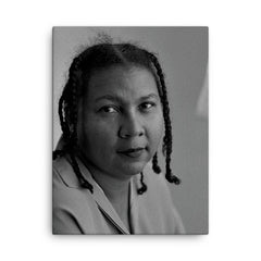 Bell Hooks canvas print on a plain backdrop in size 18"x24".