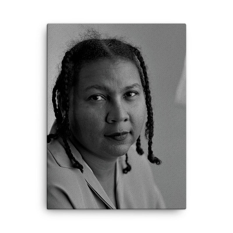 Bell Hooks canvas print on a plain backdrop in size 18