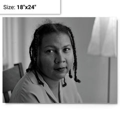 Bell Hooks metal print on a plain backdrop in size 18"x24".