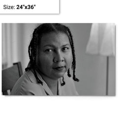 Bell Hooks metal print on a plain backdrop in size 24"x36".