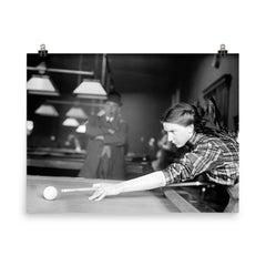 Billiards champ - a female champion billiards player lines up a shot, 1910 poster on a plain backdrop in size 8"x10".