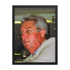 Bob Woolmer framed print on a plain backdrop in size 18"x24".