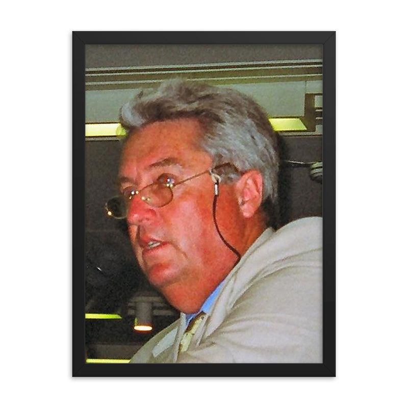 Bob Woolmer framed print on a plain backdrop in size 18