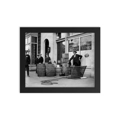 Bootleg liquor raid - Police posing with barrels of bootleg liquor seized in a raid on a Speakeasy, 1923 framed print on a plain backdrop in size 8"x10".