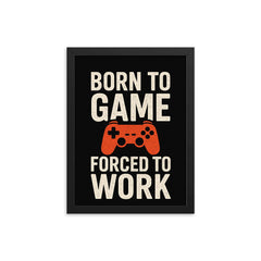 Born to game forced to work framed print on a plain backdrop in size 12"x16".