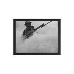 British Infantryman Advancing Through a Smokescreen During Training, 1941 framed print on a plain backdrop in size 12"x16".