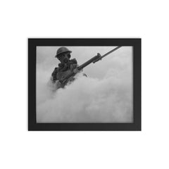 British Infantryman Advancing Through a Smokescreen During Training, 1941 framed print on a plain backdrop in size 8"x10".