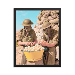 British Soldiers Wearing Gas Masks Peeling Onions at Tobruk, 1941 framed print on a plain backdrop in size 16"x20".