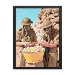 British Soldiers Wearing Gas Masks Peeling Onions at Tobruk, 1941 framed print on a plain backdrop in size 18"x24".