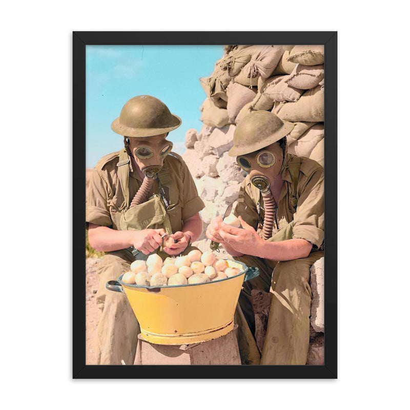British Soldiers Wearing Gas Masks Peeling Onions at Tobruk, 1941 framed print on a plain backdrop in size 18