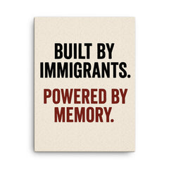 Built by immigrants Powered by memory canvas print on a plain backdrop in size 18"x24".