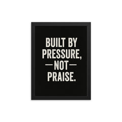 Built by pressure not praise framed print on a plain backdrop in size 12"x16".