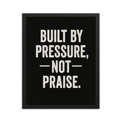 Built by pressure not praise framed print on a plain backdrop in size 16"x20".