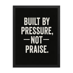 Built by pressure not praise framed print on a plain backdrop in size 18"x24".