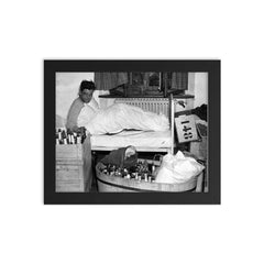 Captain Lewis Nixon of Easy Company, 506th PIR, Morning After VE Day, 1945 framed print on a plain backdrop in size 8"x10".