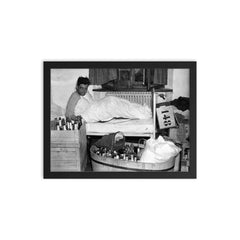 Captain Lewis Nixon of the 101st Airborne Celebrating with Goering's Private Liquor Collection, Austria, May 4, 1945 framed print on a plain backdrop in size 12"x16".