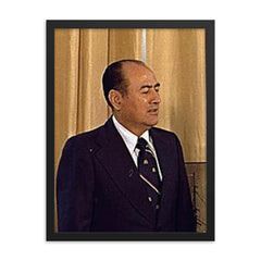 Carlos Humberto Romero framed print on a plain backdrop in size 18"x24".